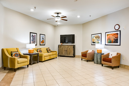 A cozy lobby area featuring comfortable seating and modern decor.
