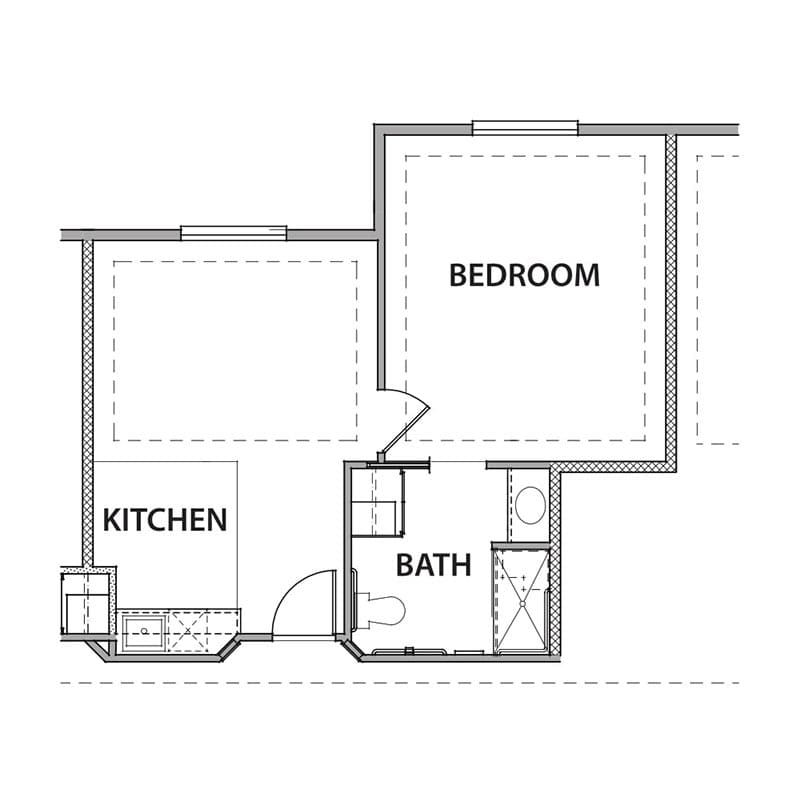 A simple floor plan of a small apartment featuring a kitchen, bathroom, and bedroom.