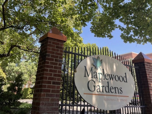 Entrance to Maplewood Gardens, showcasing a serene outdoor setting.