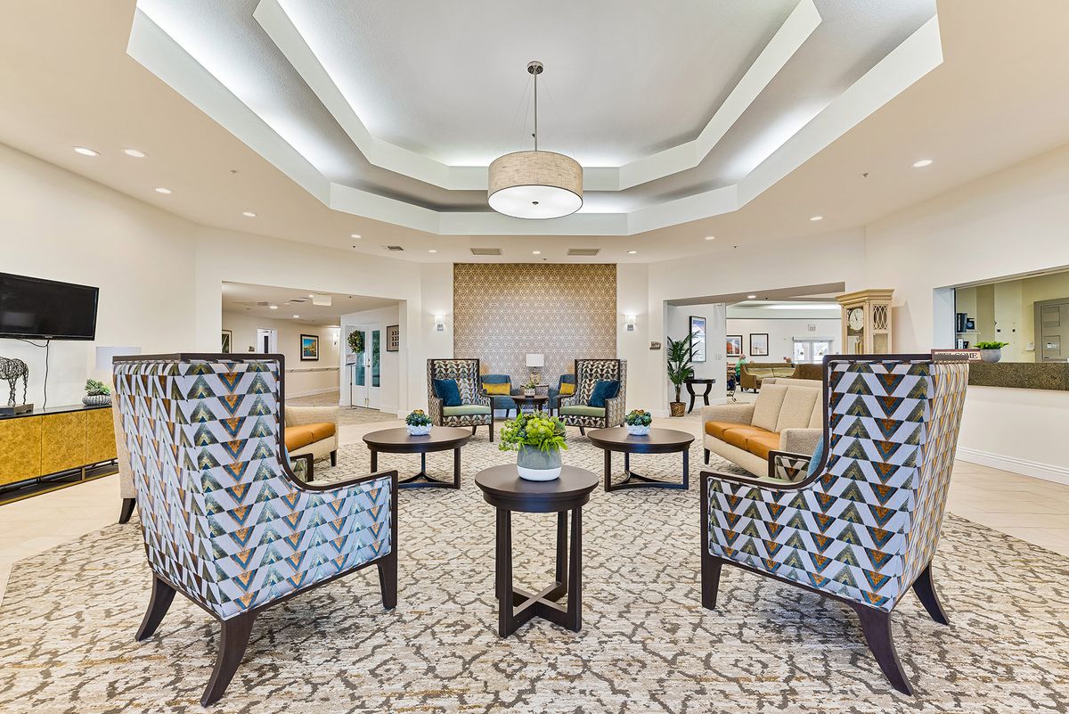 A spacious and elegantly designed lobby area with comfortable seating arrangements and stylish decor.