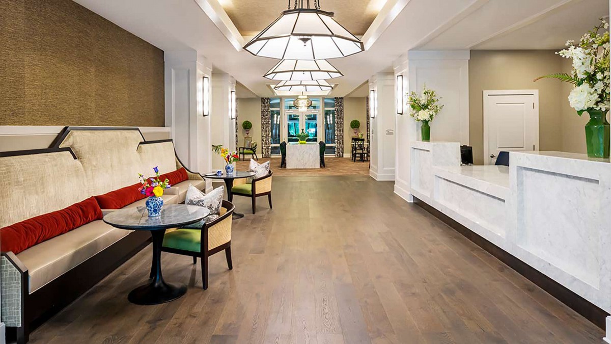 A modern and spacious lobby with elegant lighting and comfortable seating.