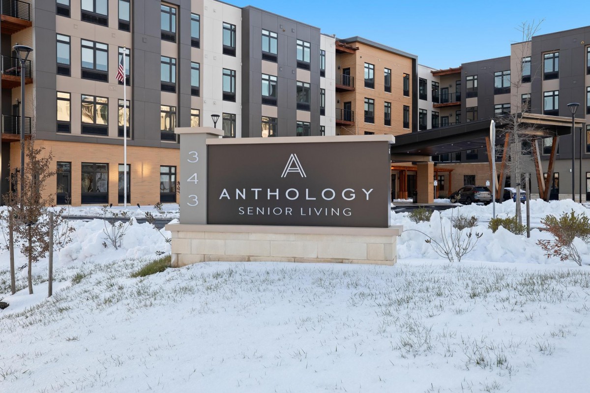 A photo of Anthology Senior Living building surrounded by snow.