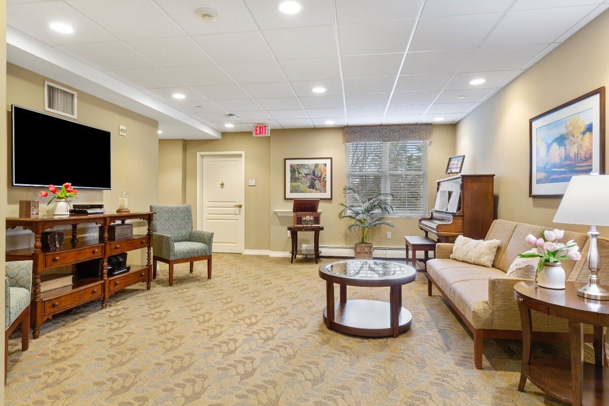 A cozy living room with comfortable seating and a television.