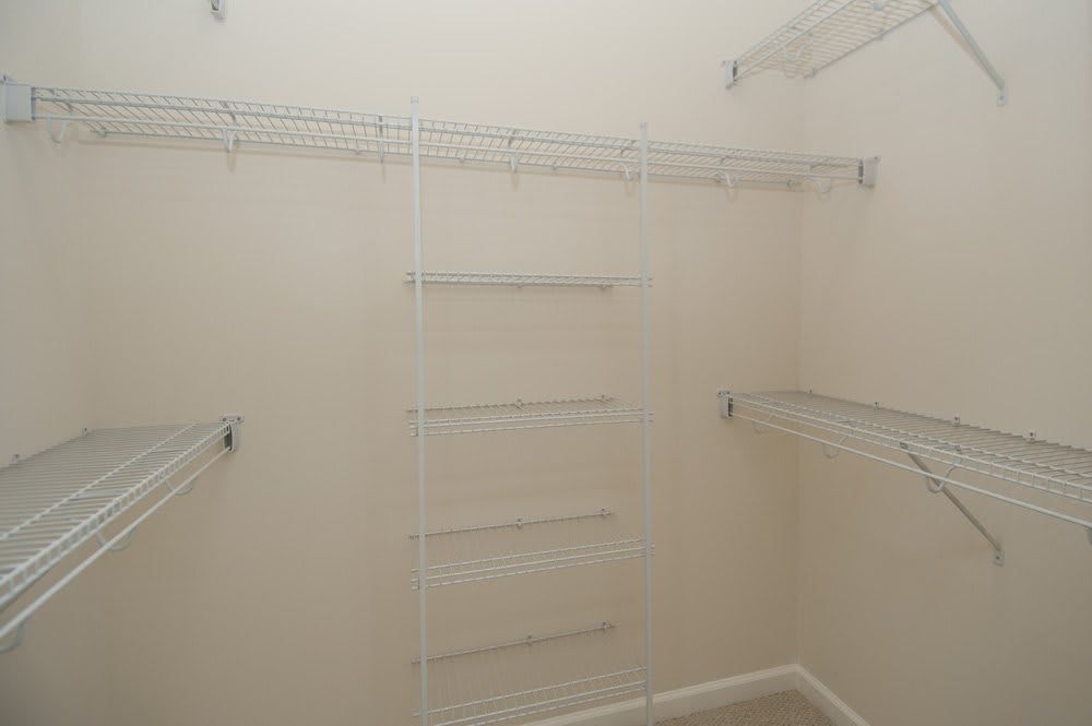 An empty closet with wire shelving for organization.