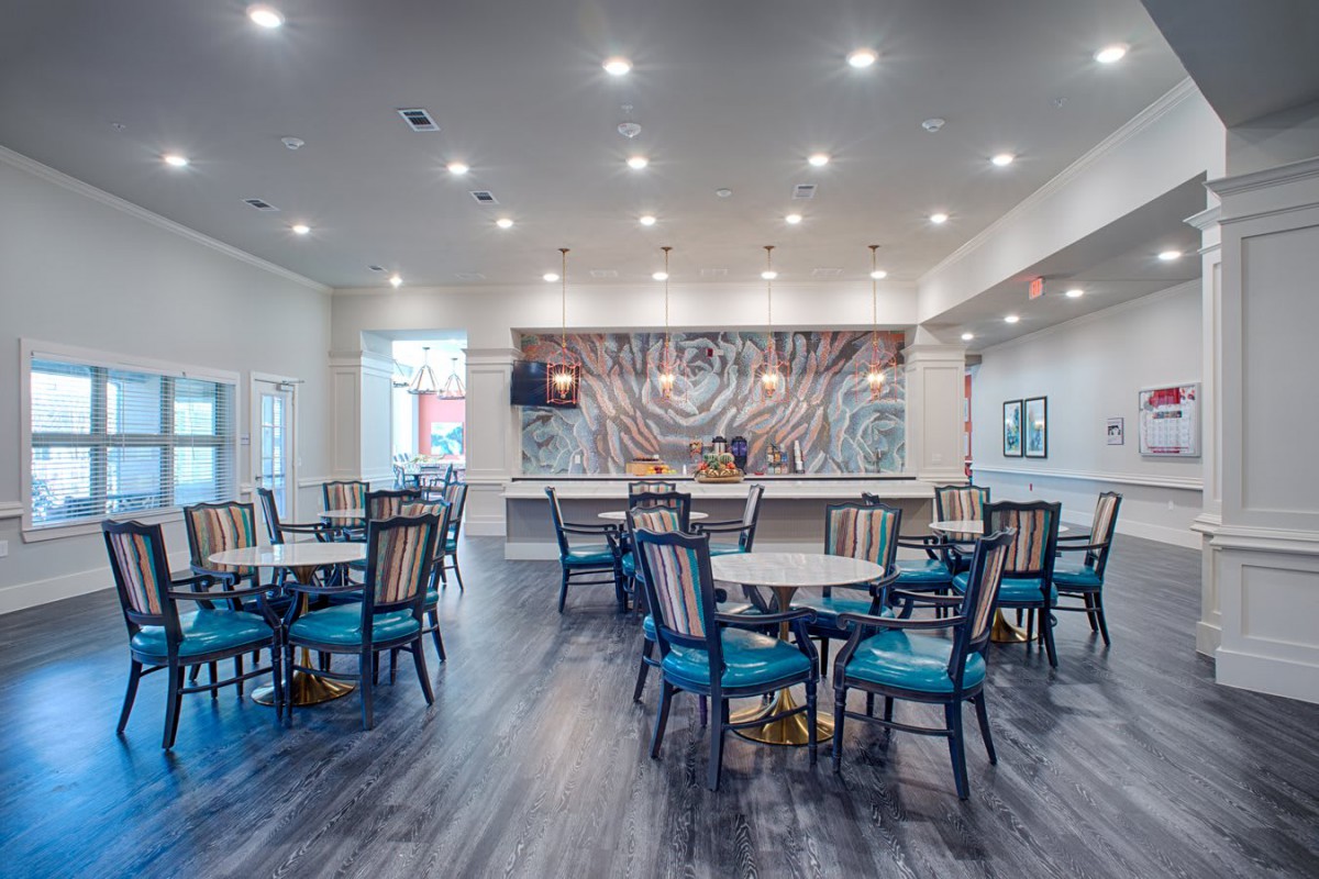 A modern dining area with stylish seating and sophisticated lighting.