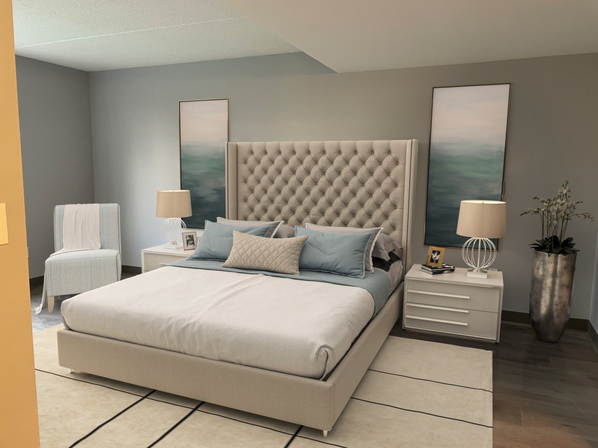 A modern bedroom with a tufted headboard, stylish nightstands, and elegant decor.