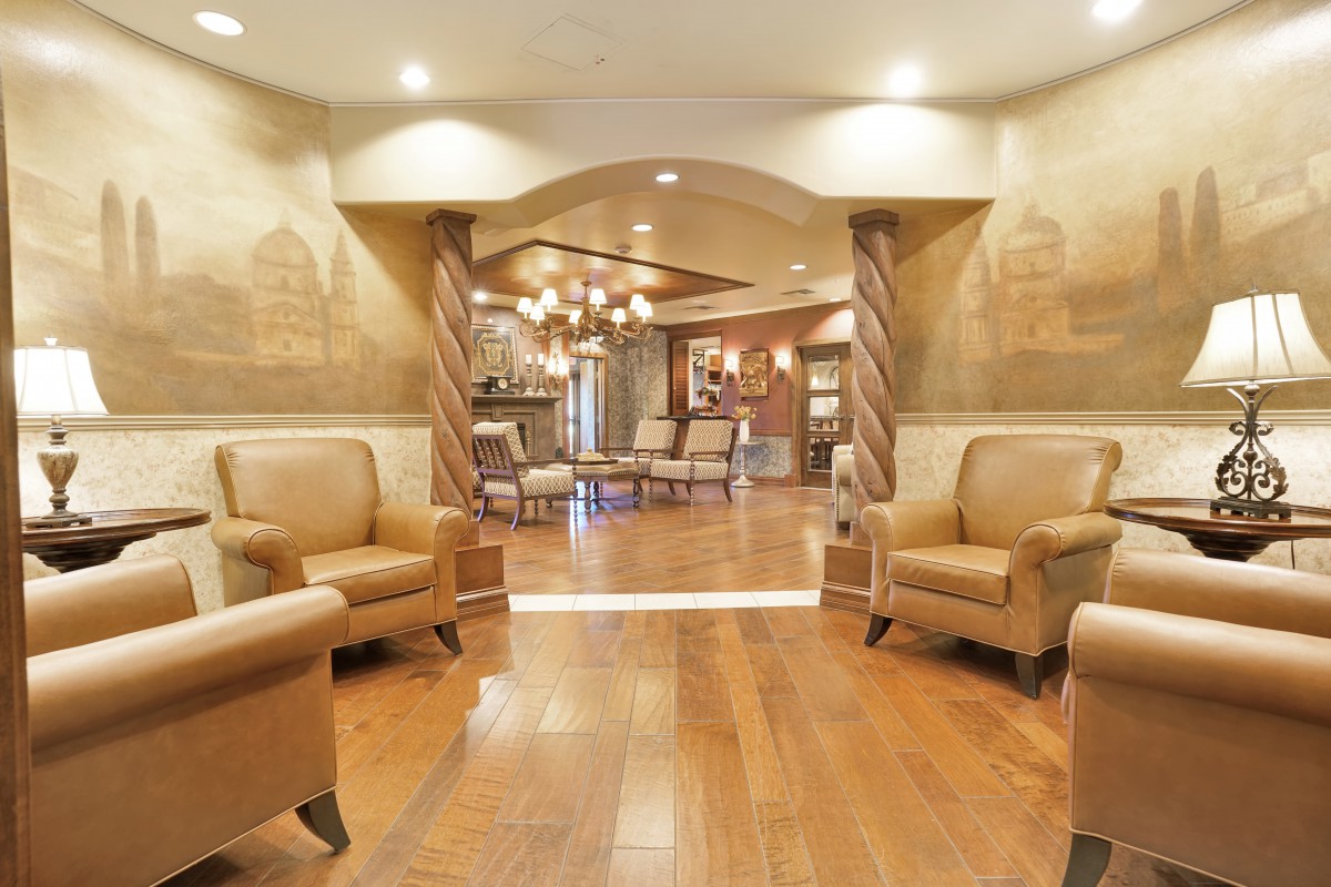 A cozy lobby area with comfortable seating and elegant lighting.