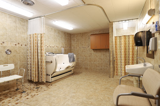 A view of a hospital bathroom equipped for patient care.