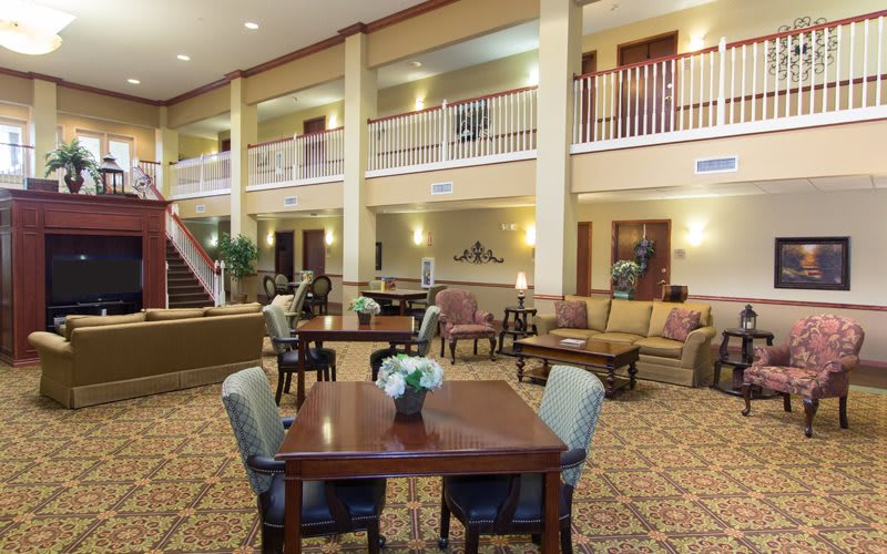 Spacious hotel lobby with comfortable seating and elegant decor.