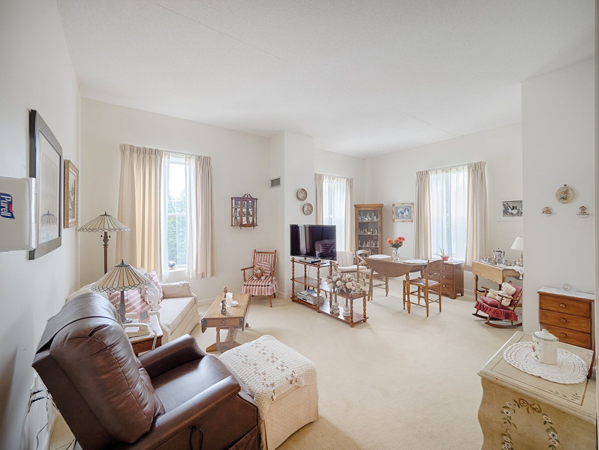 A cozy living room with elegant furniture and decor.