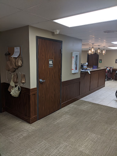 A welcoming lobby area with wooden accents and a reception desk.