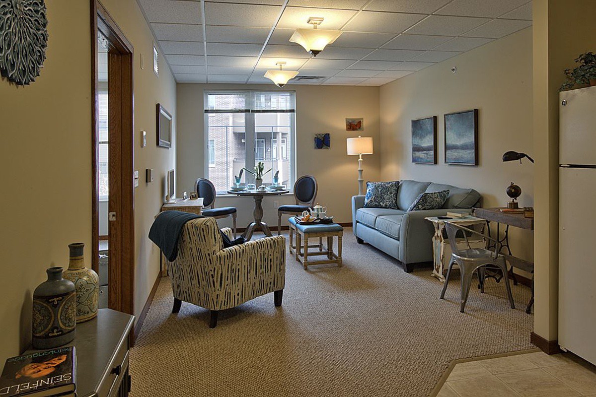 A cozy living room with comfortable seating and tasteful decor.