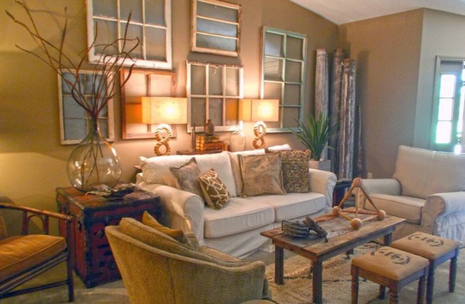 A cozy living room with vintage-style decor and warm lighting.