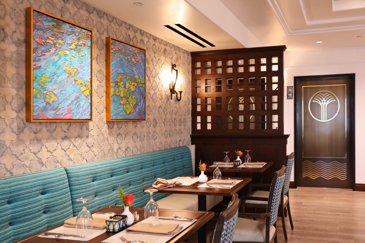 Cozy restaurant interior with stylish decor and comfortable seating.