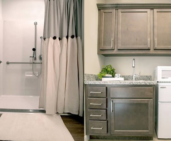 A modern bathroom featuring a walk-in shower with a curtain and a vanity area with cabinetry and a sink.