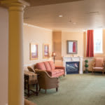 A cozy living room with comfortable seating and warm decor.