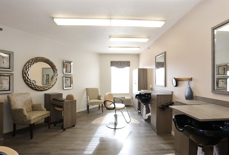 A modern hair salon with stylish chairs and mirrors, designed for comfort and efficiency.