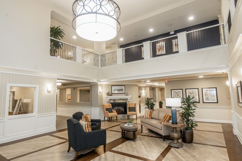 A spacious and elegantly designed lobby area with modern furnishings and decor.