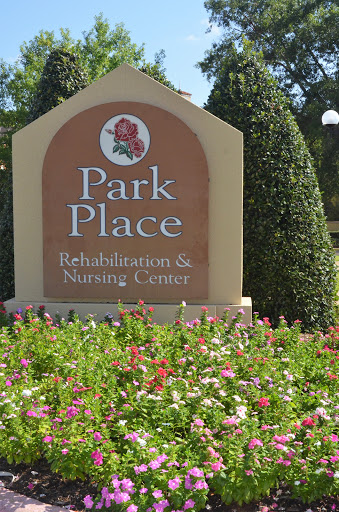 Welcome to Park Place Rehabilitation and Nursing Center, surrounded by vibrant flowers.