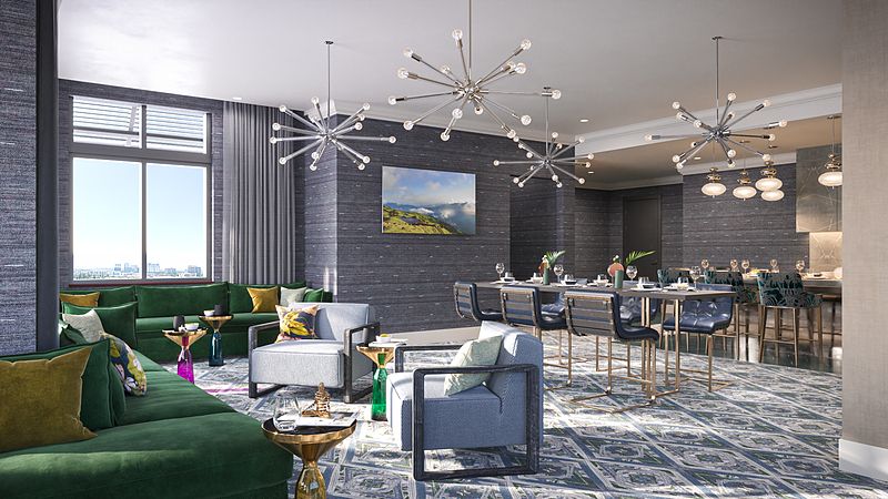 A spacious, modern living and dining area featuring stylish chandeliers, luxurious furniture, and elegant decor.