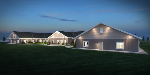 A beautifully illuminated residential property at dusk, showcasing modern architectural design.