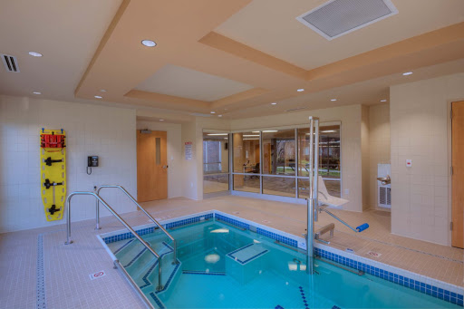 A serene indoor pool area designed for relaxation and wellness.