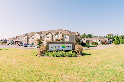 A bright and welcoming day at a residential apartment complex.
