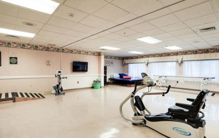 A rehabilitation center equipped with exercise machines and therapy facilities.