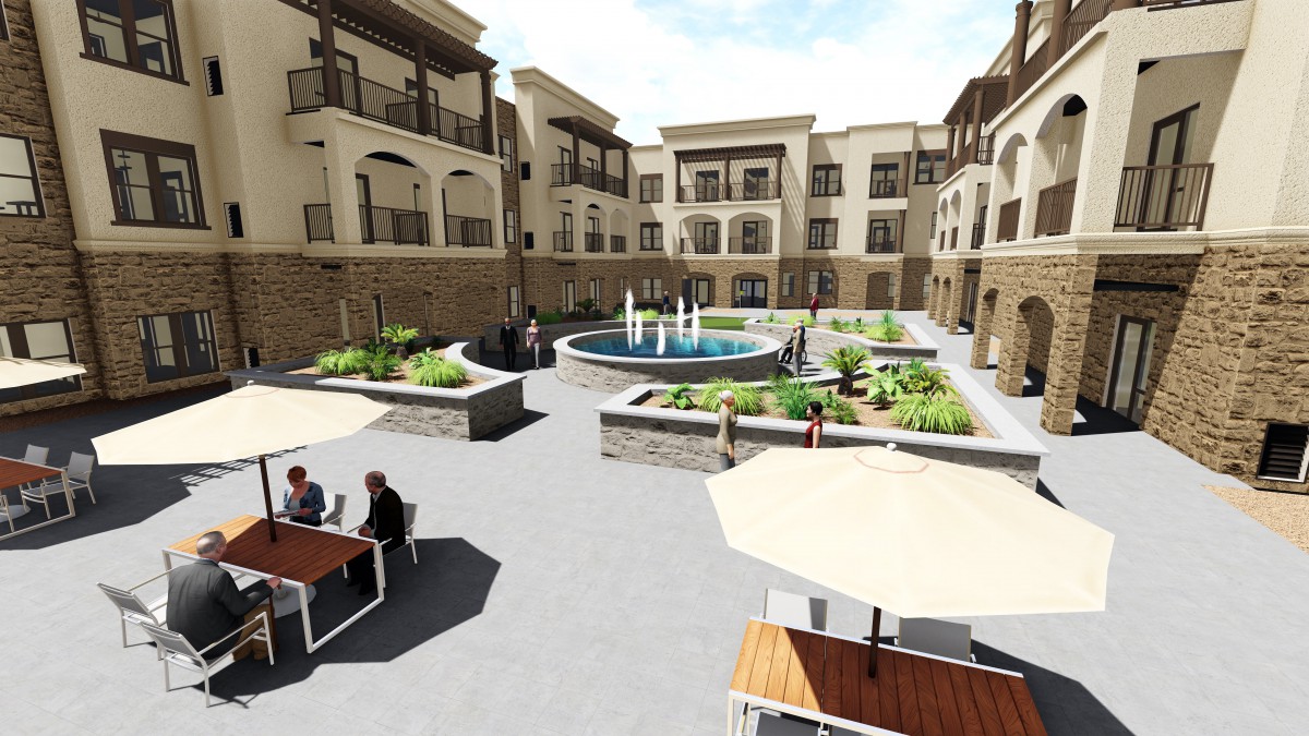 A scenic courtyard with apartments surrounding a central fountain, featuring outdoor seating and landscaped areas.
