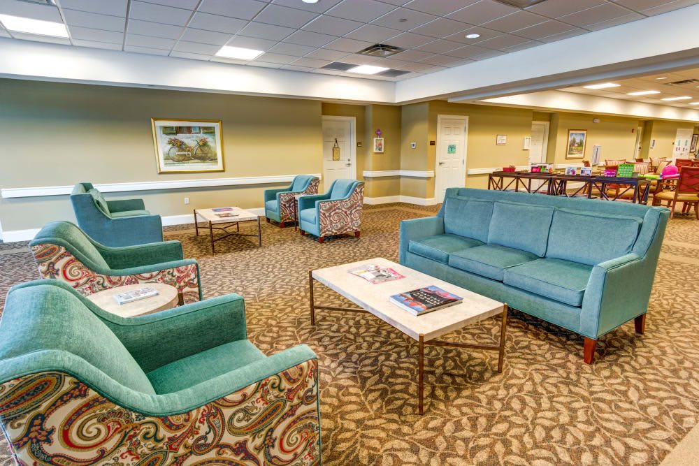 A spacious lobby with comfortable seating and a warm ambiance.