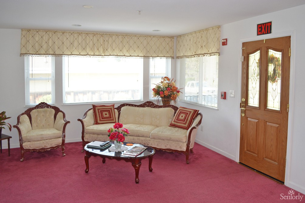 A cozy living room with classic furniture and warm decor.
