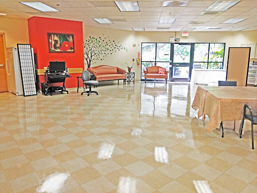 A spacious and inviting lobby area featuring comfortable seating and decorative elements.