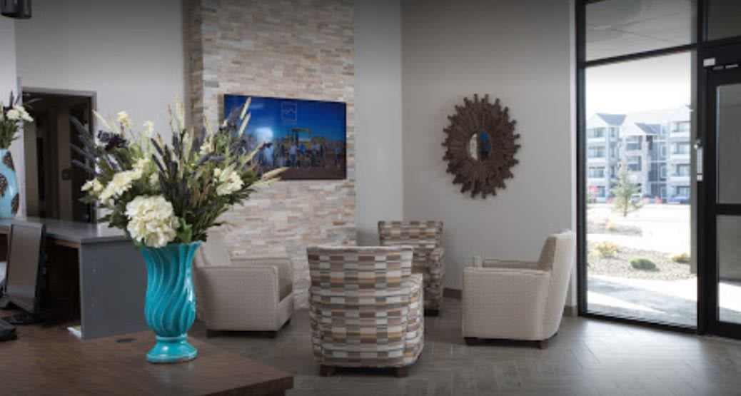 A modern lobby with comfortable seating and stylish decor.
