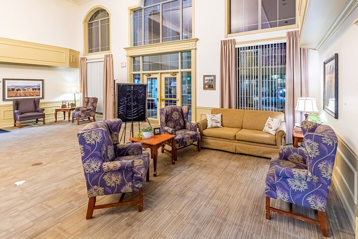A cozy living room with comfortable seating and a warm ambiance.