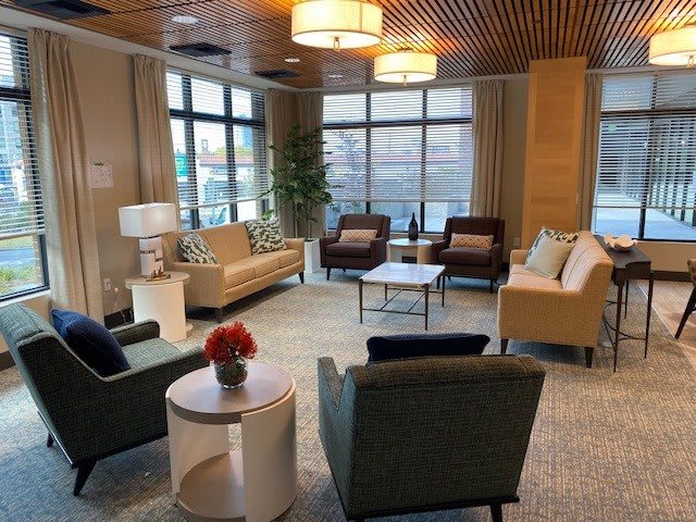 A modern lobby with comfortable seating and stylish decor.