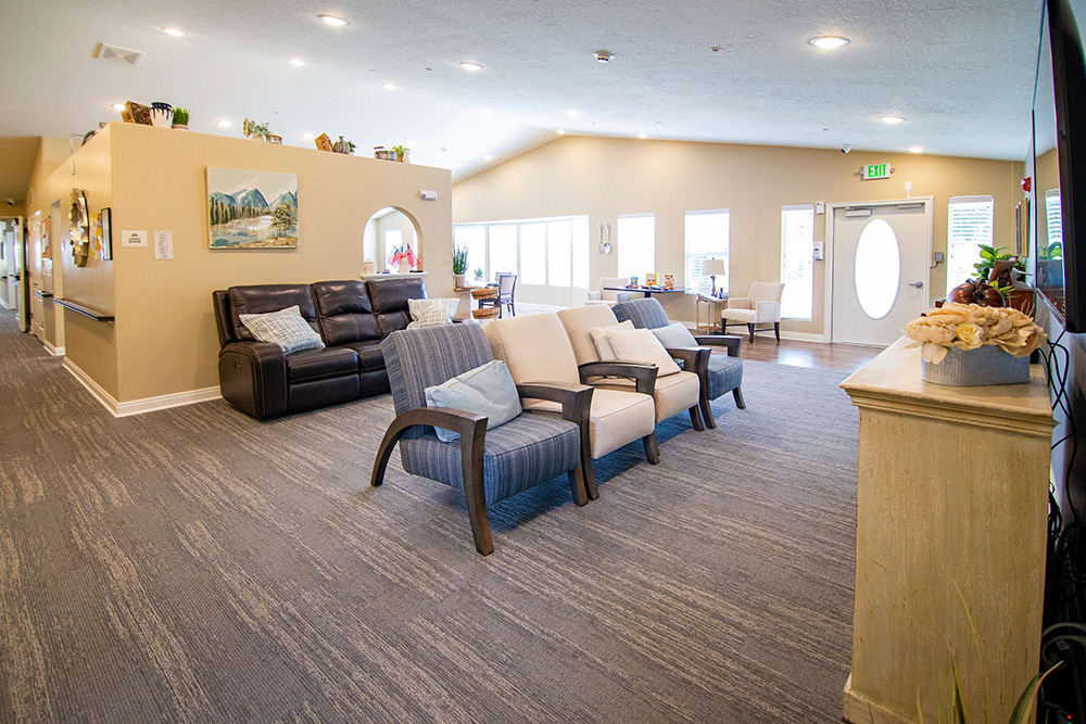 A cozy living room with comfortable seating and modern decor.