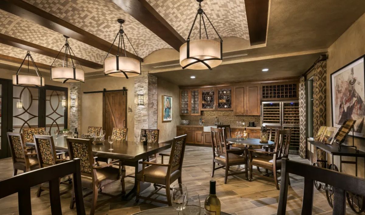 A beautifully designed dining room with rustic elements and a cozy atmosphere.