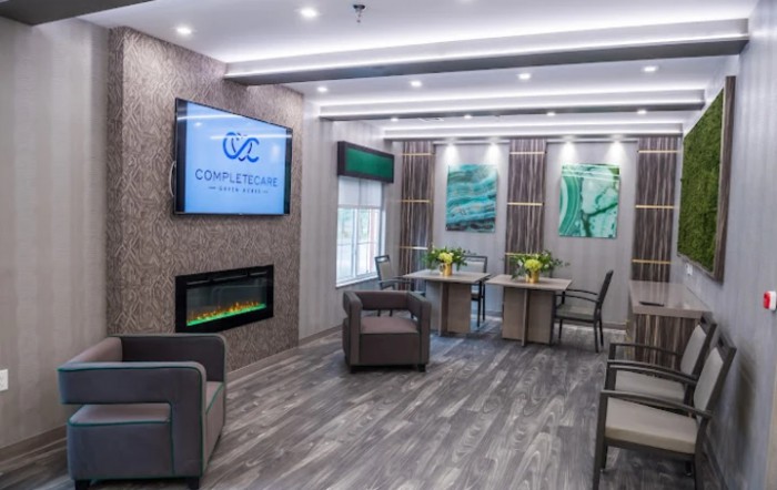 A modern waiting room with comfortable seating and stylish decor.