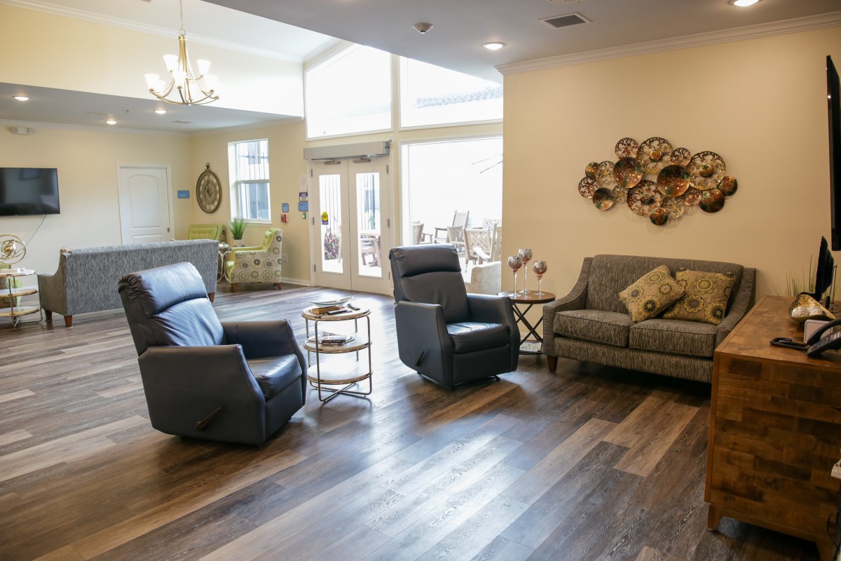 A modern living room with comfortable seating and stylish decor.