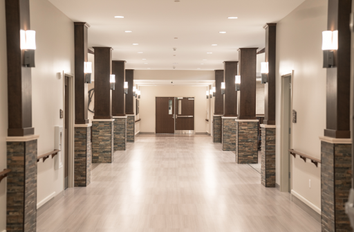 A modern hallway with elegant lighting and stylish architectural features.