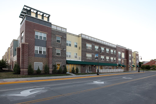A multi-story commercial building in an urban setting.