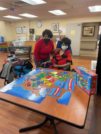 A child and an adult engage in a fun puzzle activity together, focusing on teamwork and learning.