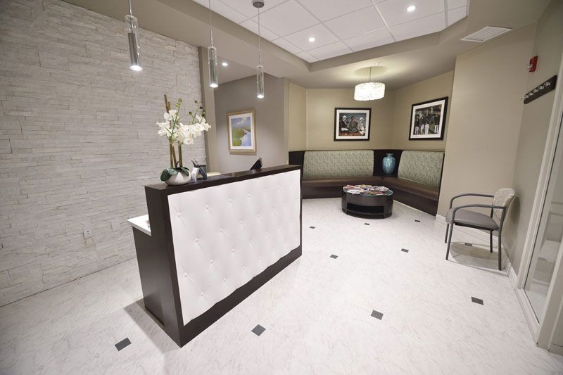 A modern reception area with a sleek design and comfortable seating.