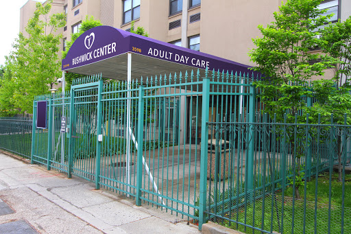 Entrance to an Adult Day Care Center with a fenced area.