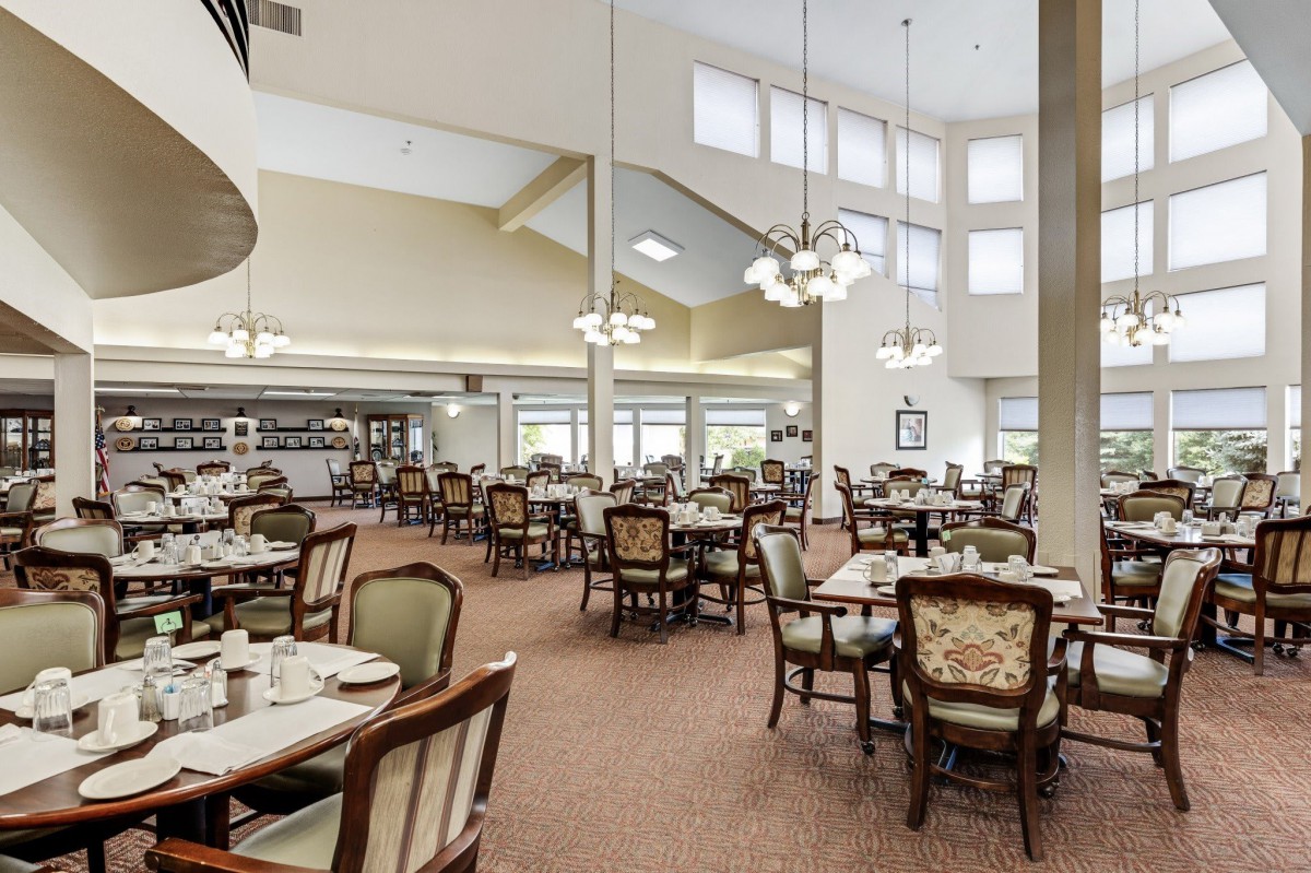 Spacious dining area with elegant decor and abundant seating.