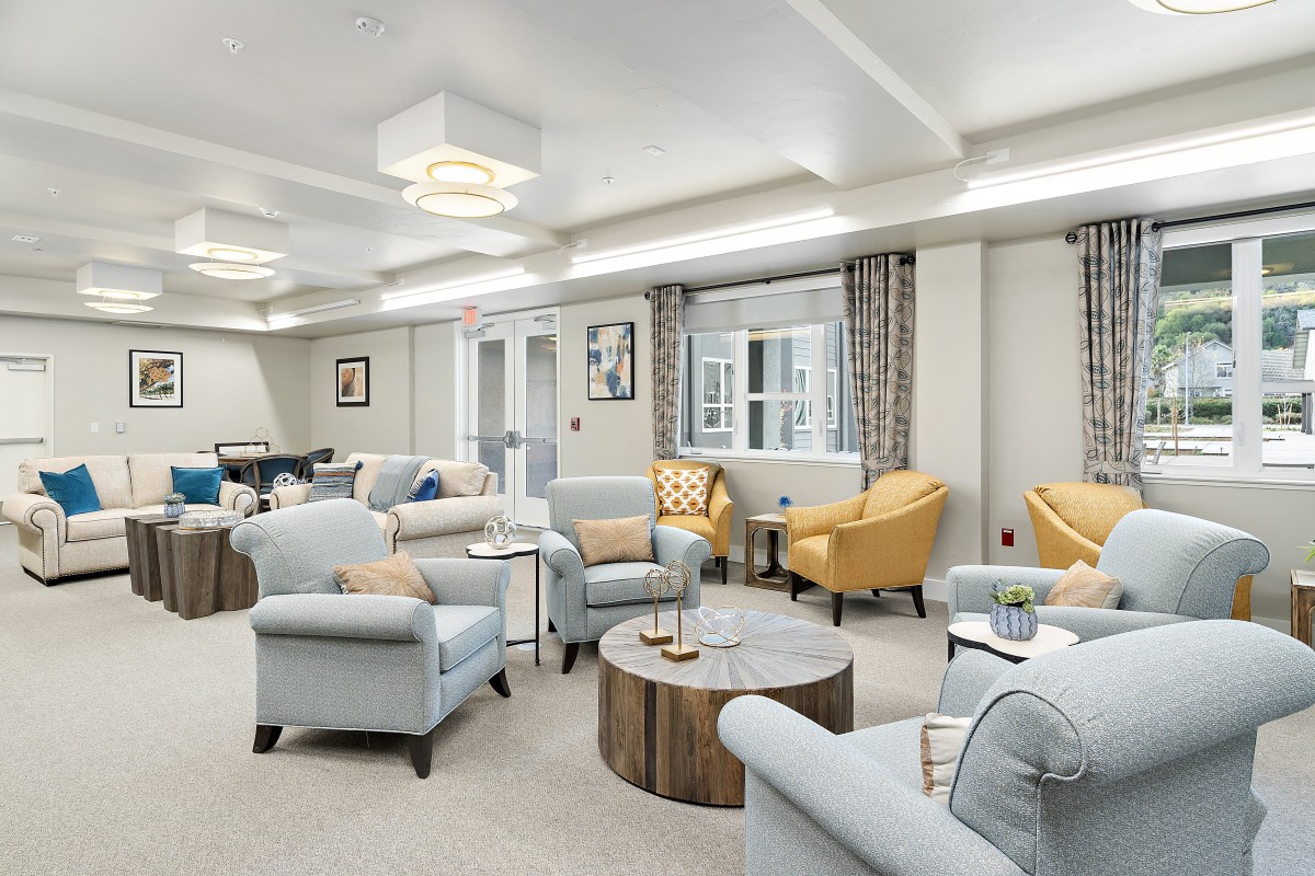 A modern and cozy living room with comfortable seating and stylish decor.