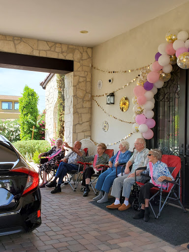 A cheerful gathering of seniors enjoying a sunny day together.