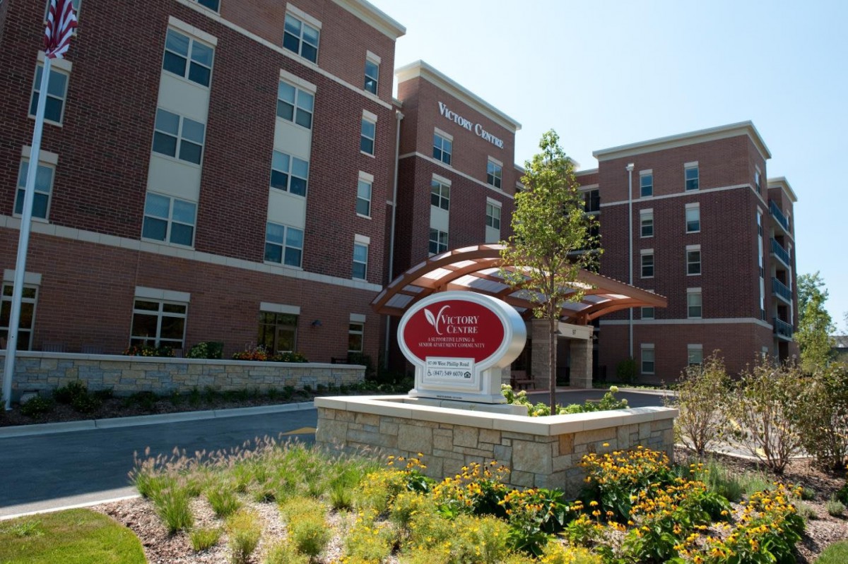 The exterior of a modern hospital building with a welcoming entrance.