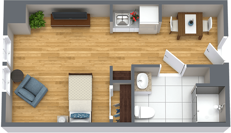 A compact apartment floor plan featuring a bedroom, kitchen, and bathroom.