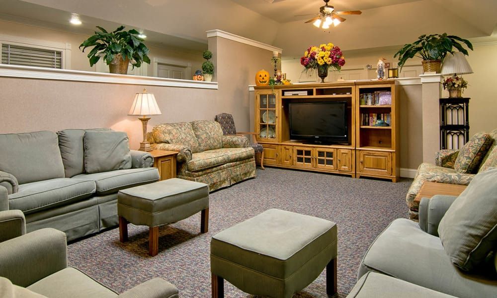 Cozy living room with comfortable seating and a television setup.